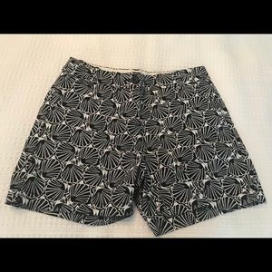 Blue and white patterned shorts. Never worn size 4